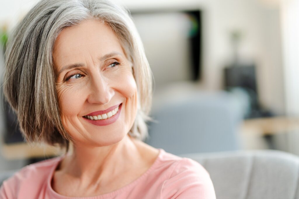 Closeup,Portrait,Smiling,Confident,Senior,Woman,Sitting,On,Comfortable,Sofa